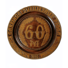 Turned wooden plate with the inscription "On the occasion of the Honorable Jubilee 60m"