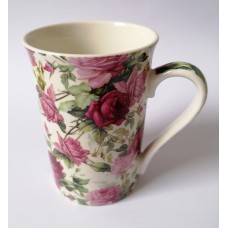 A small cup withe rose decorations