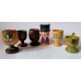 6 variously decorated wooden eggs stands