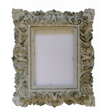Artfully forged frame made of plaster