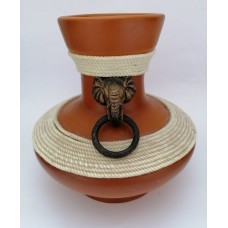 Exotic, clay, oriental jug with metal handle and elephant head